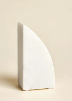 Fermalibri in marmo
