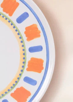 Piatto da pizza in ceramica con orlo decorato