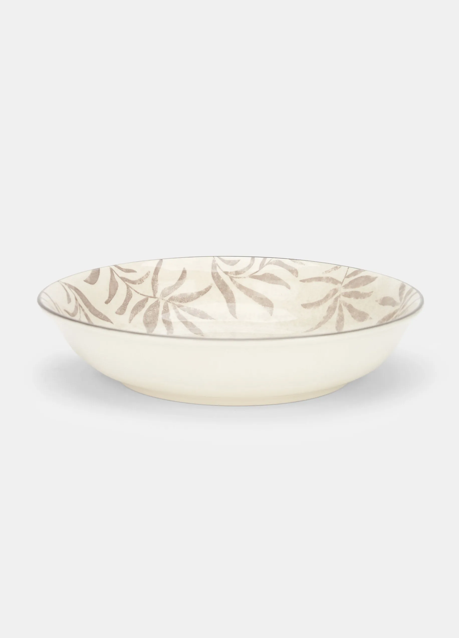 Piatto fondo in ceramica con foglie
