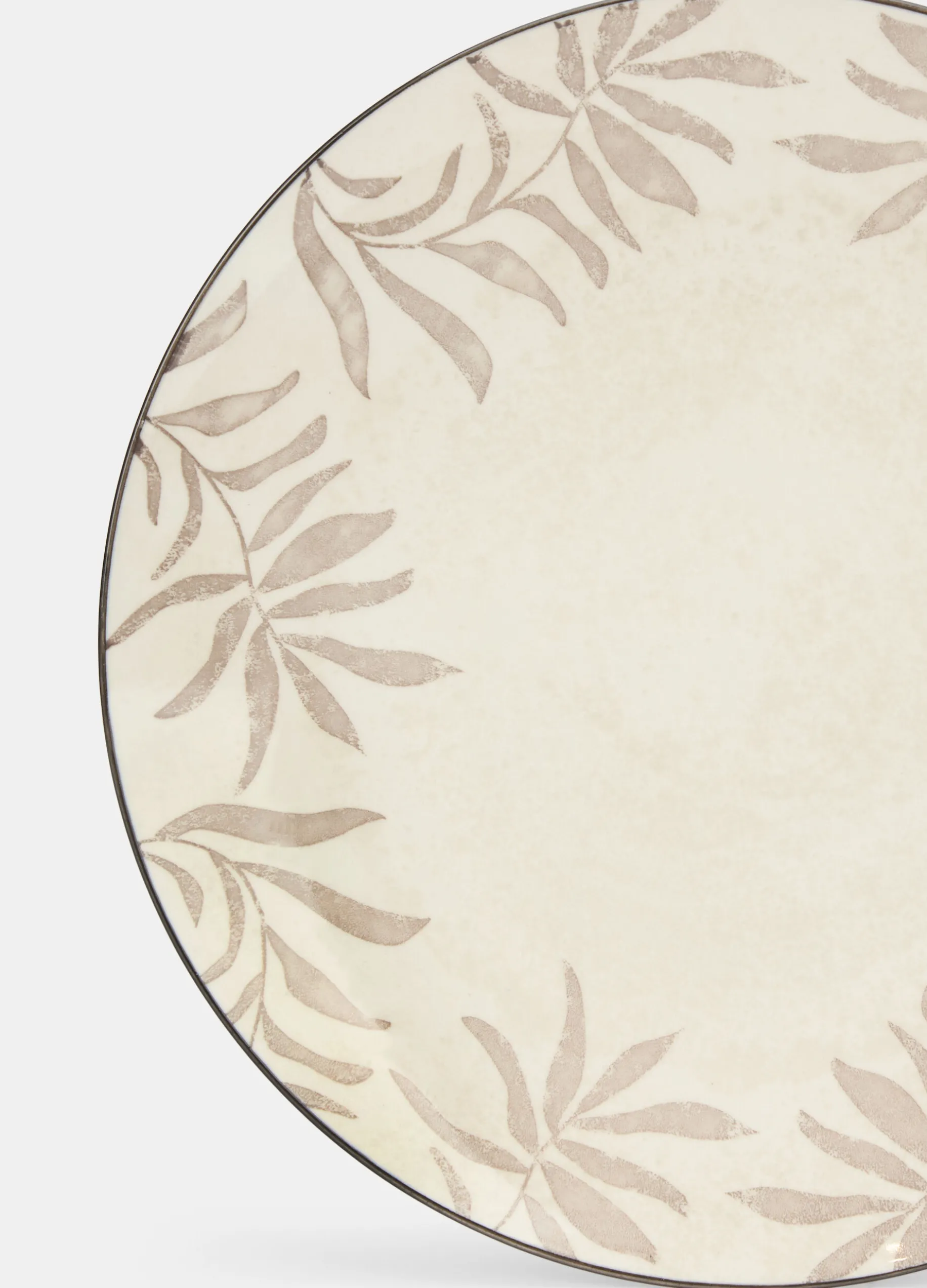 Piatto piano in ceramica con foglie