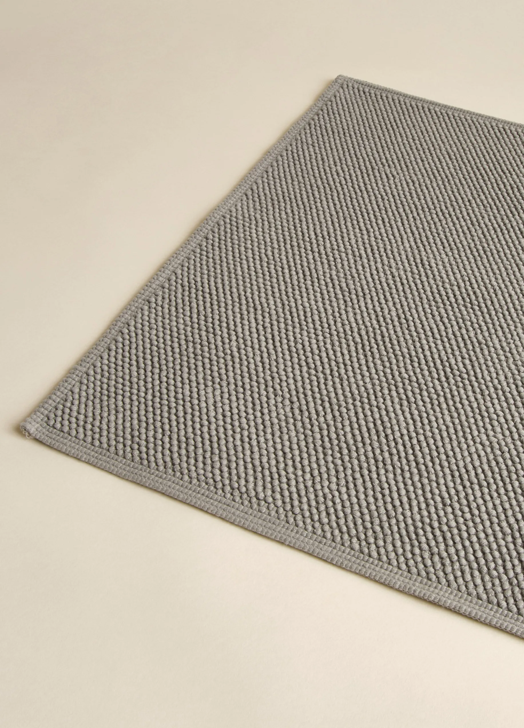 Tappetino bagno in cotone con motivo 3D